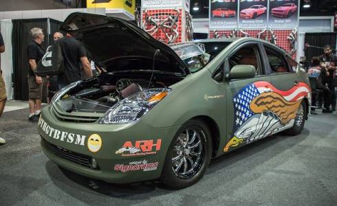 PriuSRT8: Hellcat powered Prius. Savagery has a face..
