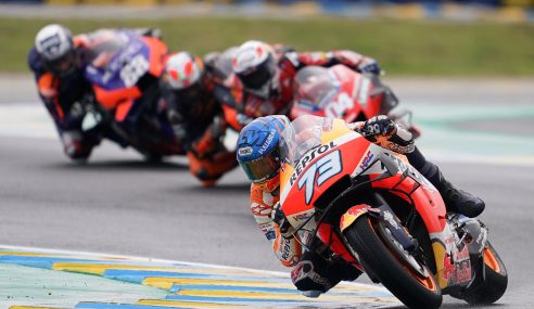 Alex Marquez conquers the wet for debut MotoGP podium