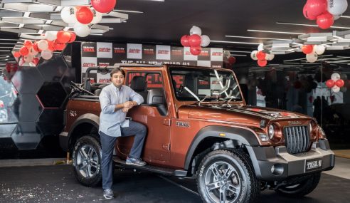 Mahindra hands over new Thar #1 to auction winner Aakash Minda