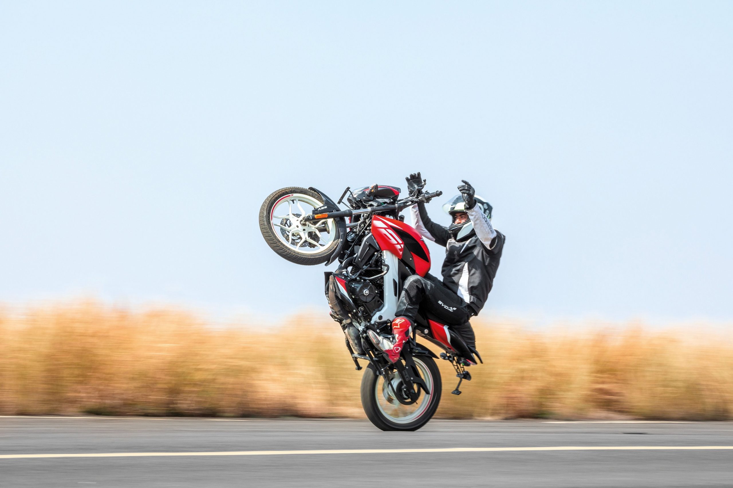 Bajaj Pulsar NS160 breaks the world record for the longest no-hands wheelie